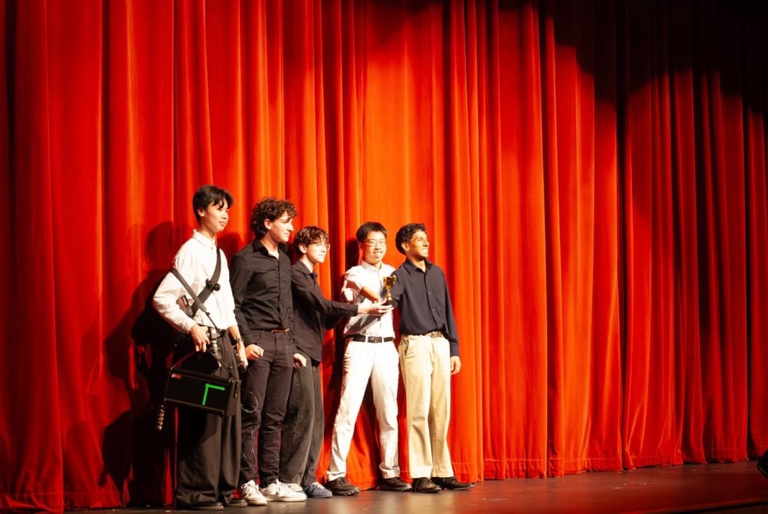 Orange Jasmine on stage at talent show